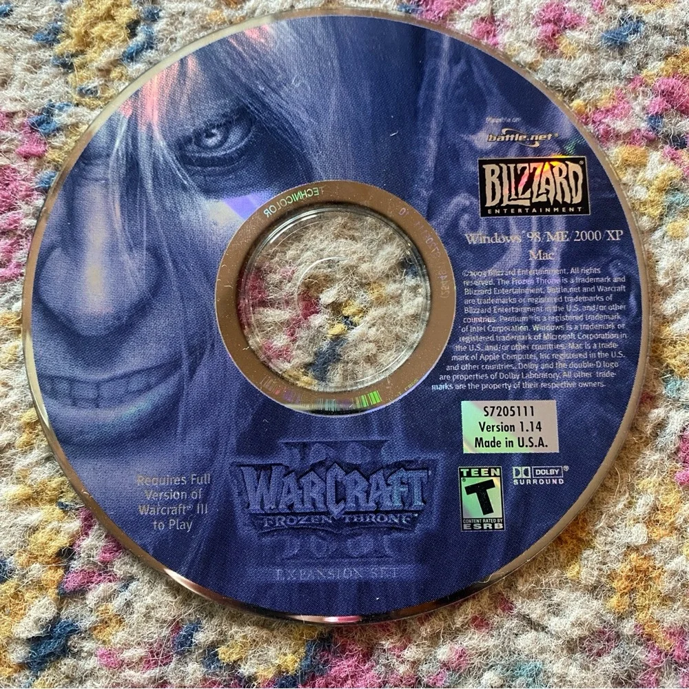 Blizzard Warcraft and Ubisoft Dark Messiah PC Game Discs